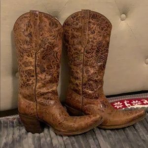 Cowgirl boots, come just under the knee.